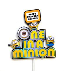 a happy birthday cake topper with minion characters