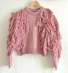 Unique Sweater                                                              . Material - Unmarked. Appear to be Acrylic                                     . Lining - No                                     . Color – Rustic Pink                   �                  . Sleeve – Long Sleeve                                     . Closure – Crew Neck. Pullover                                     . Pocket - None                                                                           . Style – Cropped, Trendy Fringe Tops For Winter, Unique Sweater, Sweater Cropped, Unique Sweaters, Cropped Pullover, Sweater Crop, Sweater Material, Fringe Trim, No Color