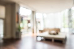 blurry image of living room with couch and coffee table