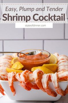 the shrimp cocktail is served in a white bowl with lemon wedges