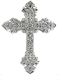 an ornate cross on a white background