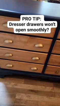 an old dresser has been painted black and gold with the words pro tip dress drawers won't open smoothly?