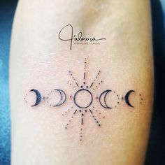 three phases of the moon tattoo on someone's leg