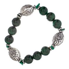 "Find the John Bead Malachite Natural Stone Stretch Bracelet with Flower Beads at Michaels. com. This handmade bead bracelet, made using dyed green malachite and silver flower beads, will make a fantastic addition to your accessory collection. This charming stretch bracelet uses high-quality elastic, which is sturdy and able to be stretched to fit most wrists. This handmade bead bracelet, made using dyed green malachite and silver flower beads, will make a fantastic addition to your accessory co Green Malachite, Flower Beads, Bracelets Handmade Beaded, Bead Designs, Silver Flowers, Bead Bracelet, Stretch Bracelet, Beaded Flowers, Picture Show