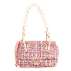 This is an authentic CHANEL Tweed Medium Pearl Handle Flap in Pink, Beige, Orange, and Ecru. This stylish shoulder bag is beautifully crafted of pink tweed. The bag features an oversized pearl top handle, a gold chain leather-threaded shoulder strap, and a front flap with a gold Chanel CC turn lock. This opens the front flap to a pink fabric interior with a zipped pocket. Pearl Top, Chanel Pearls, Chanel Tweed, Pink Tweed, Gold Chanel, Chanel Shoulder Bag, Pink Chanel, Bag Measurements, Stylish Shoulder Bag