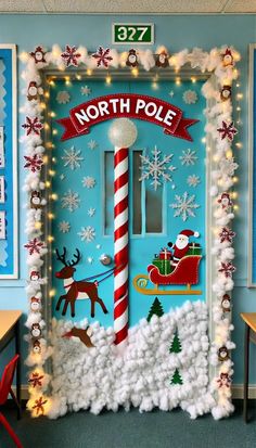 the door to north pole is decorated with snow and christmas decorations, including santa's sleigh