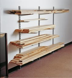 the shelves are made out of wood and metal