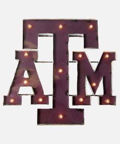 marquee letters with lights on them spelling out the word jam in front of a white background