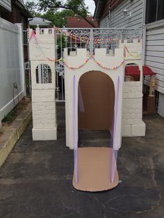 a cardboard castle made to look like it is outside