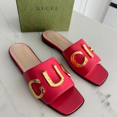 Brand New In Box. 100% Authentic Gucci Cara Logo Leather Slide Sandals Size 36 Style - 694858 C9d00 070 6712 Color- Runway Coral Stunning Gucci Cara Slides Features Hammered Gold Letters Across The Vamp To Spell Gucci. Comes Exactly As Shown In Photos. Includes Box, Dustbags And Papers. Retail $1050 Plus Tax. Elegant Red Gucci Sandals, Gucci Luxury Flat Heel Sandals, Gucci Designer Flat Sandals, Gucci Flat Sandals For Formal Occasions, Gucci Formal Flat Sandals, Gucci Designer Sandals With Red Sole, Gucci Leather Sandals With Red Sole, Flat Gucci Sandals With Red Sole, Designer Slip-on Sandals With Red Sole