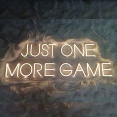 a neon sign that says just one more game