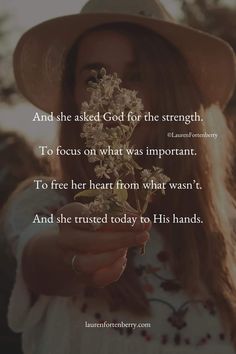 a woman wearing a hat holding a flower in her hand with the quote and she asked god for the strength to focus on what was important