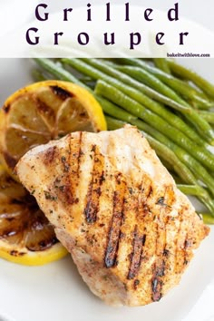 grilled chicken and green beans on a white plate with the words grilled grouper