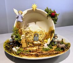 a plate with nativity figurines on it