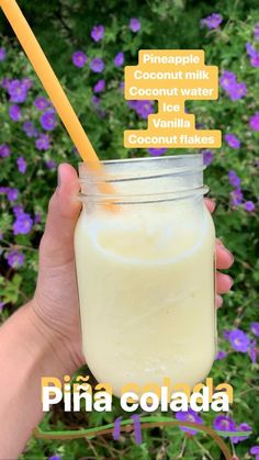 a hand holding a mason jar filled with liquid and labeled the ingredients to make it