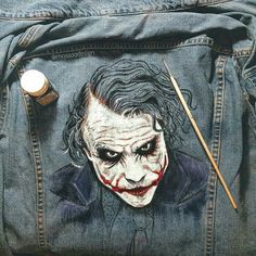 the joker jean jacket has been painted on to it