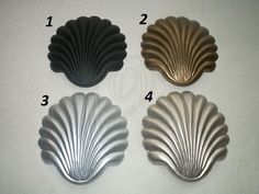 four different types of seashells are shown in this image with the numbers on them