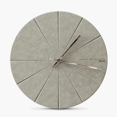 a clock that is made out of concrete