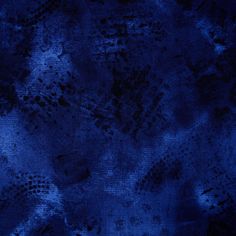 an abstract blue background with black spots