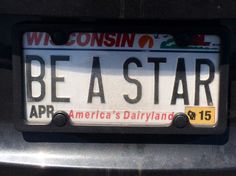 a license plate with the words be a star on it