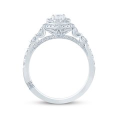 a white gold engagement ring with diamond accents