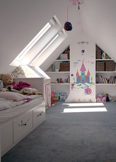 an attic bedroom is decorated in white and has bookshelves with stuffed animals on them