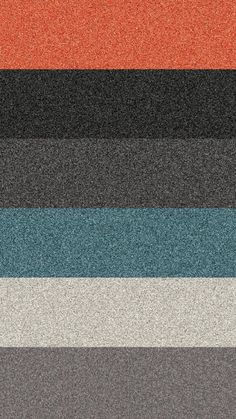 an assortment of different colors of carpet on the floor, including black, gray, orange, and blue