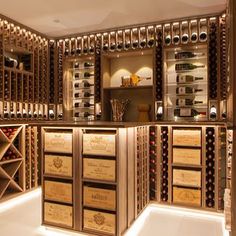 a wine cellar filled with lots of bottles