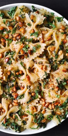 Parmesan Garlic Butter Pasta with Fresh Basil, Lemon, and Pine Nuts on a white plate Pine Nuts Pasta, Bow Tie Pasta Recipe, Pasta With Lemon, Garlic Butter Pasta, Meatless Pasta, Pine Nut Recipes, Lemon Garlic Butter Sauce, Lemon Garlic Pasta, Basil Pasta