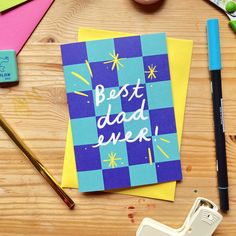 a father's day card with the words best dad ever on it next to some craft supplies