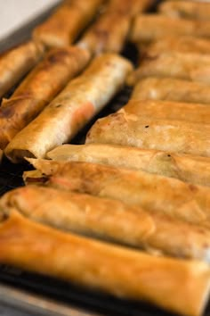 some food is cooking on a grill and ready to be cooked in the oven for consumption