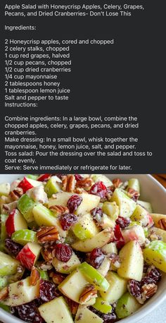 a salad with apples, cranberries and pecans in it