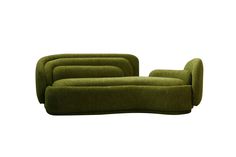 a green couch sitting on top of a white floor