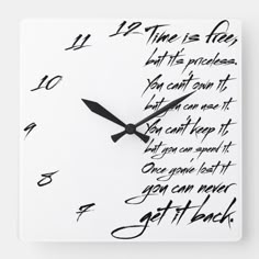 a clock that has writing on it