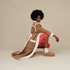 Imagine you could climb into your favorite UGG® boot and wear it like a blanket... that's exactly what the Classic Robe delivers. With a nod to vintage style, the interior features our toasty UGG®fluff and the exterior is defined by rich spill seams and a luxe collar. Ultra comfy, super cozy, and heritage-inspired, you'll find yourself slipping into this belted robe every chance you get. | Full length robe with plush fleece exposed spillseam trim. 100% Recycled Polyester. Self belt with spillseam trim. Front patch pockets. UGG® woven license plate label on center back. The UGG® Logo woven flag label on wearer's left side pocket. 51 inch HPS Length [Size S]. 50 inch HPS Length [Size 2X]. Imported. | UGG® Women's Classic Robe Fleece/Recycled Materials Robes in Chestnut, Size S Robe For Women, Ugg Boot, Belted Robe, Ugg Classic, A Blanket, Womens Uggs, Side Pocket, Ugg Boots, Chestnut