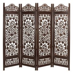 Add a hint of charm with this traditional 4 panel folding screen room divider in your home space. Providing function in a stylish way, these room dividers work double duty as privacy screens and standing against a wall as a large accent piece, or in the middle of a room to add some privacy and divided space, this room divider is too style to hide away. This item comes shipped in one carton. Suitable for indoor use only. Made in India. Features 4 carved screen panels. Traditional theme Color: One Temporary Room Dividers, Folding Screen Room Divider, Fabric Room Dividers, Bamboo Room Divider, Sliding Room Dividers, Wood Room Divider, 4 Panel Room Divider, Wooden Room Dividers, Hanging Room Dividers