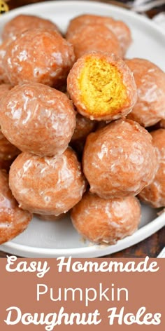 homemade pumpkin doughnut holes on a white plate with text overlay that reads easy homemade pumpkin doughnut holes