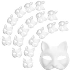 a white cat mask with many smaller masks around it