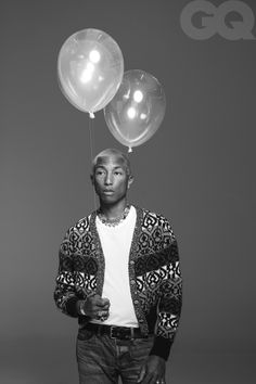 a man with two balloons on his head