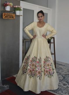 Lively, youthful, and sophisticated - This Cream color floor-length gown is crafted with the utmost care to bring out your feminine charm in a pleasant way. For more details please contact us through WhatsApp +61470219564. Shipping Worldwide Traditional Cream Floor-length Gown, Anarkali Tussar Silk Dress With Resham Embroidery, Floor-length Tissue Silk Anarkali Set, Resham Embroidery Maxi Dress For Reception, Silk Ball Gown With Fitted Bodice, Floor-length Raw Silk Anarkali Set For Wedding, Floor-length Tussar Silk Anarkali Set With Resham Embroidery, Formal Raw Silk Floor-length Dress, Traditional Floor-length Evening Dress For Reception