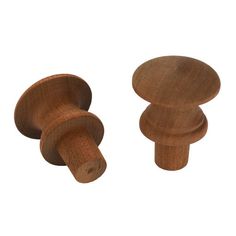 two wooden knobs on a white background