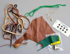 an assortment of crafting supplies including scissors and string