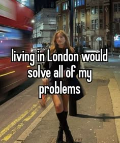 a woman standing on the street with her legs crossed and texting living in london would solve all of my problems