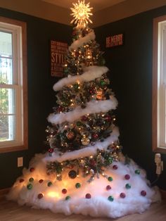 a christmas tree made out of fake snow