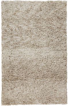 an area rug with white and beige colors