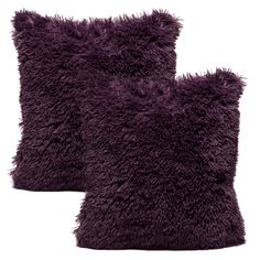 two dark purple pillows with fluffy fur on the front and back, one is made out of