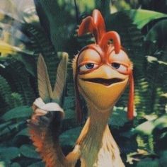 an animated bird with red hair and big eyes in the jungle, holding a banana