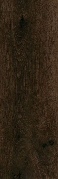 a close up view of a wood grain flooring textured with dark brown stain