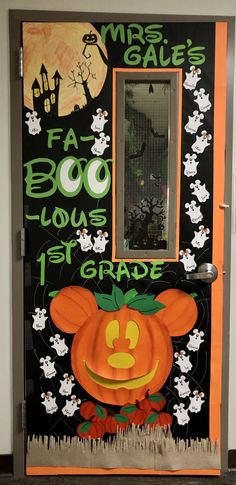 a door decorated to look like a pumpkin