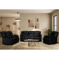 a living room filled with black furniture and decor